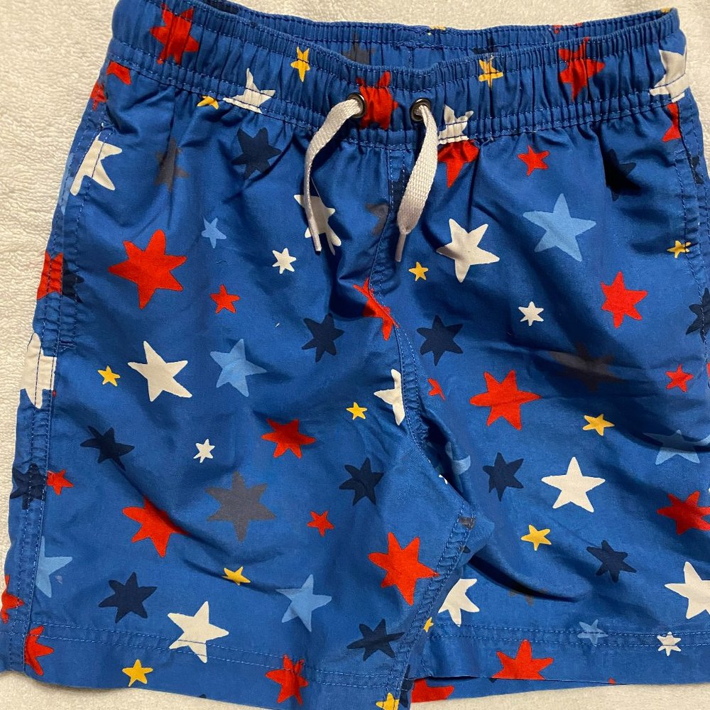Boys Hannah Anderson swim trunks.